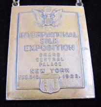 Load image into Gallery viewer, 1923 INTERNATIONAL SILK EXPOSITION Medallion GRAND CENTRAL PALACE NY W&amp;H
