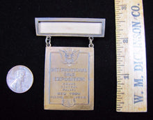 Load image into Gallery viewer, 1923 INTERNATIONAL SILK EXPOSITION Medallion GRAND CENTRAL PALACE NY W&amp;H
