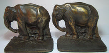 Load image into Gallery viewer, Grazing Elephants Bookends Old Cast Iron Pair Bronze Wash High Relief Detailed
