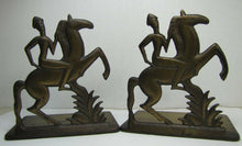 Load image into Gallery viewer, Orig Old Art Deco Stylized Horse Rider Bookends cast iron brass bronze wash mod
