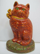 Load image into Gallery viewer, Old Cast Iron Cat Doorstop orange green eyed kitten detailed door stopper
