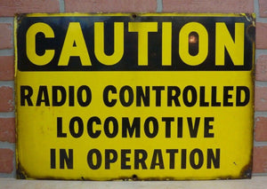 CAUTION RADIO CONTROLLED LOCOMOTIVE IN OPERATION Old Porcelain Sign RR Train