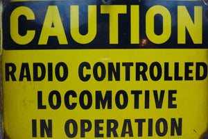 CAUTION RADIO CONTROLLED LOCOMOTIVE IN OPERATION Old Porcelain Sign RR Train