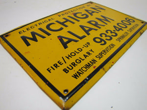 MICHIGAN ALARM Old Embossed Tin Advertising Sign FIRE HOLD-UP BURGLARY WATCHMAN