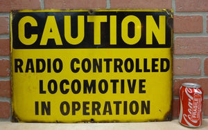 CAUTION RADIO CONTROLLED LOCOMOTIVE IN OPERATION Old Porcelain Sign RR Train