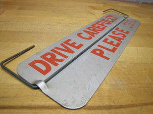 DANGEROUS DRIVE CAREFULLY PLEASE QUICK-WAY MUSKEGON MICHIGAN Old Spinner Ad Sign