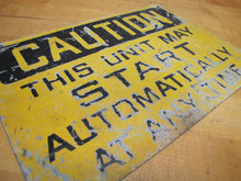 Load image into Gallery viewer, Old CAUTION THIS UNIT MAY START AUTOMATICALLY Industrial Steel Safety Ad Sign
