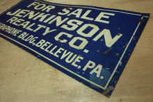 Load image into Gallery viewer, JENKINSON REALTY Co CAMERAPHONE Bldg BELLEVUE PA Old Embossed Tin Ad Sign
