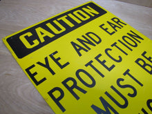 Load image into Gallery viewer, CAUTION EYE AND EAR PROTECTION MUST BE WORN Old Sign Industrial Repair Shop Ad
