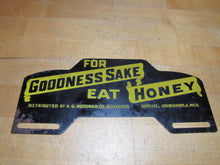 Load image into Gallery viewer, FOR GOODNESS SAKE EAT HONEY Old License Plate Topper Ad Sign WOODMAN Co BEEKEEPERS SUPPLIES GRAND RAPIDS MICH
