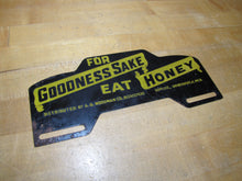 Load image into Gallery viewer, FOR GOODNESS SAKE EAT HONEY Old License Plate Topper Ad Sign WOODMAN Co BEEKEEPERS SUPPLIES GRAND RAPIDS MICH
