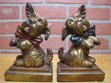 Load image into Gallery viewer, ARMOR BRONZE Co Taunton Mass 1920s Decorative Arts Scottish Terrier Puppy Bowtie Begging Pair Bronze Clad Figural Bookends

