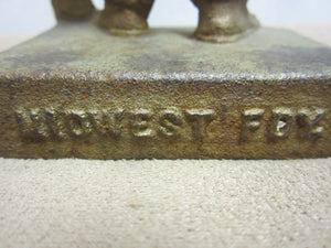Antique MIDWEST Foundry Advertising Cast Iron Doorstop Sandy fdy worker book end